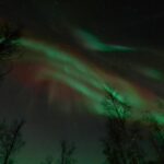 Ii: Snowmobile sleigh trip on frozen sea under starlit sky - The Sum Up