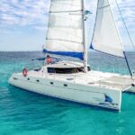 Isla Mujeres Catamaran Tour with Open Bar, Lunch and Snorkeling - The Sum Up