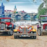 Karlstejn Castle in Vintage Convertible Car - Price and Value