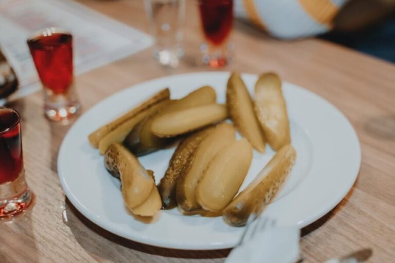 Krakow: Polish Liquor Tasting Guided Tour with Tapas - The Itinerary in Detail