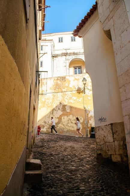 Lisbon: Alfama, Mouraria Walking Tour with Fado Night, Tapas - A Deep Dive into the Experience