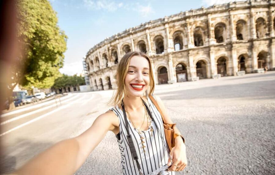 Nimes: Ancient Roman Arena Ticket & Old Town Audio Tour - The Sum Up