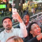 NYC: Sightseeing Night Tour by Open-Top Bus with Live Guide - Neighborhoods and Hidden Gems
