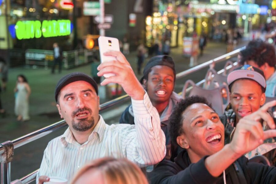 NYC: Sightseeing Night Tour by Open-Top Bus with Live Guide - Neighborhoods and Hidden Gems