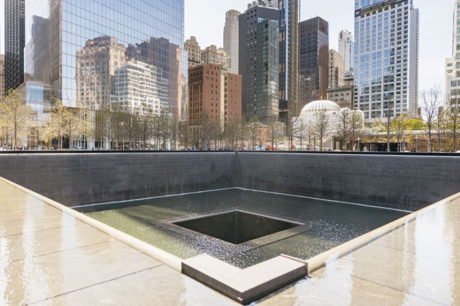 NYC: Wall Street Tour with 9/11 Memorial and Statue Ferry - Visiting Federal Hall and Trinity Church