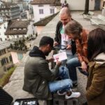 Outdoor Escape Game with Augmented Reality trough Zurich - A Detailed Look at the Experience