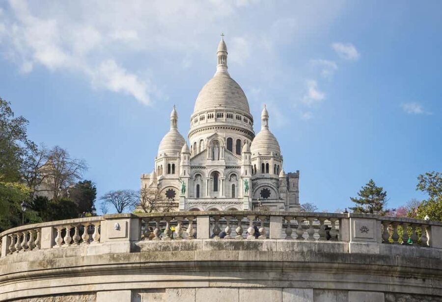 Paris: Montmartre Guided Walking Tour and Seine River Cruise - Hidden Gems and Iconic Landmarks