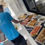 Pasito Blanco: Private catamaran excursion with food & drink - The Sum Up