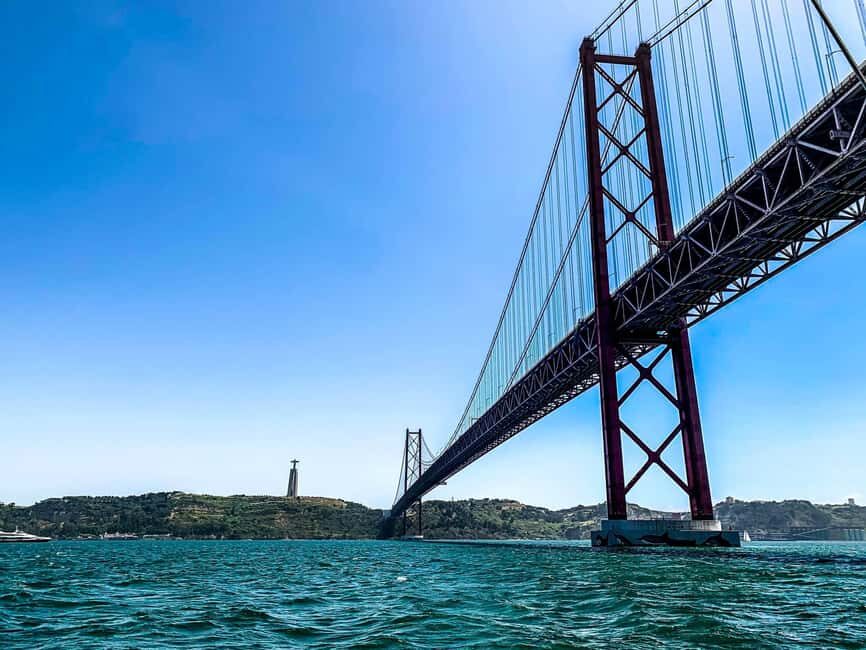 Photo Shoot on a Sailboat Overlooking Lisbon - The Sum Up