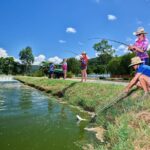 Port Douglas Tour Hook-A-Barra with Lunch - Deep Dive into the Experience