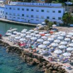 Porto Santo Stefano: La Caletta beach club - Cocktails under the umbrella - FAQ