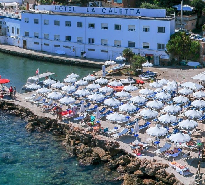Porto Santo Stefano: La Caletta beach club - Cocktails under the umbrella - FAQ