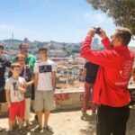 Porto: Tuk Tuk Sunset Tour with Glass of Port Wine - The Guided Experience and Commentary