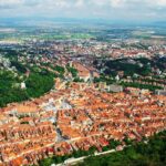 Private Guided Tour of Peles Castle and Bran Castle from Bucharest - Discovering Brasov: Medieval Charm and Mountain Views