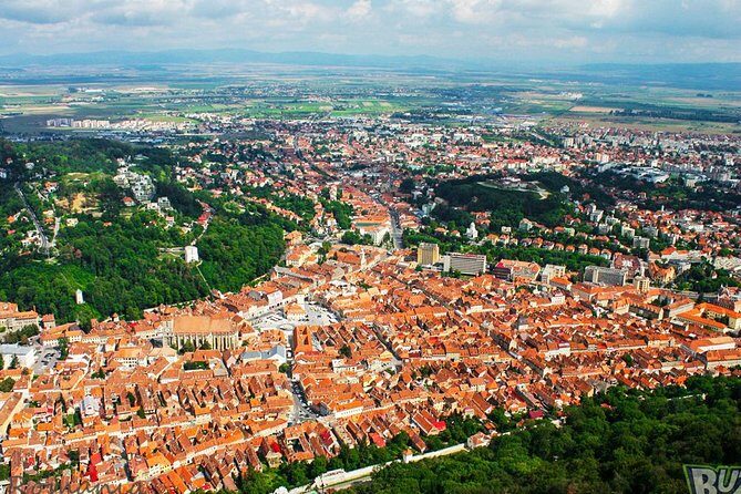 Private Guided Tour of Peles Castle and Bran Castle from Bucharest - Discovering Brasov: Medieval Charm and Mountain Views