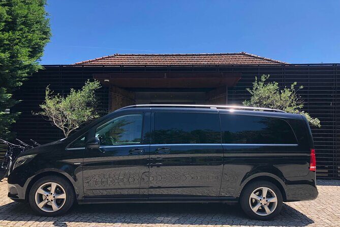 Private transfer from Porto to Lisbon with two Sightseeing stops - The Sum Up
