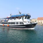 Rhodes Town: Scenic Cruise to Lindos with Swim Stops - Exploring Lindos Village: Three Hours of Free Time