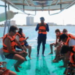 Sail around cancun in the best transparent boat + 2 drinks - A Deep Dive into the Cancun Glass-Bottom Cruise