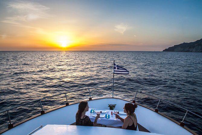 Santorini: Motor Yacht Sunset Cruise with 5-Course Dinner - The Atmosphere and Group Size