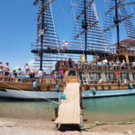 Side: Dolphin Boat Tour With Lunch Foam party Swimming - FAQ