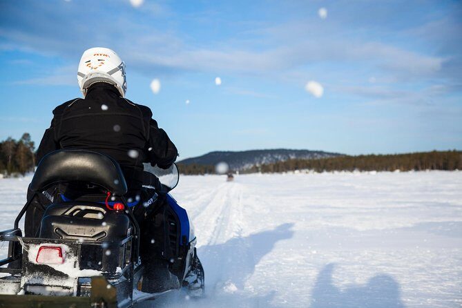 Snowmobile Safari to Lake Inari, meet & feed Reindeers, Lunch - Authenticity and Guest Experience