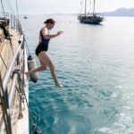 Sunset Dinner Cruise: Swim Stop, Drinks & Onboard Dining - Frequently Asked Questions