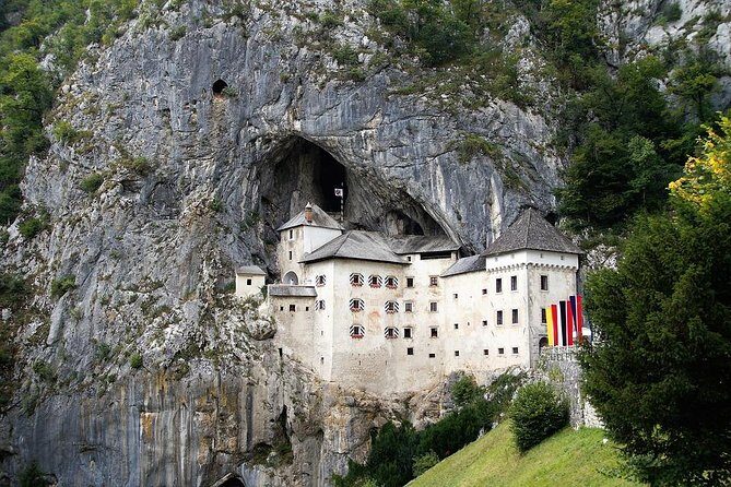 Tour to Postojna and Predjama Castle from Koper - Predjama Castle: A Brief but Bitting Photo Stop