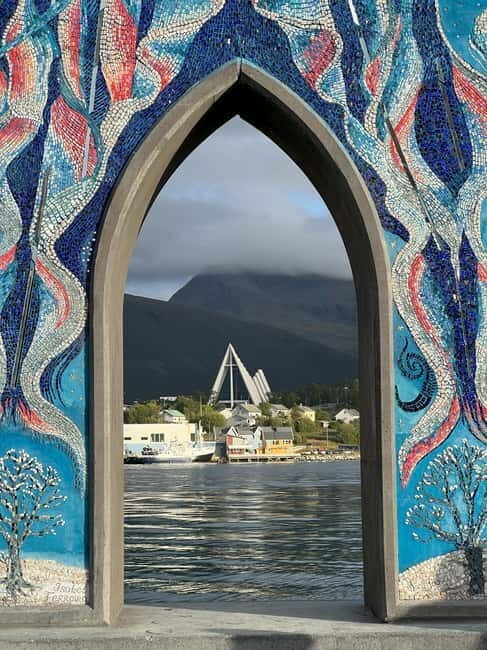 Tromsø: Evening City Walking Tour with Arctic Stories - Walking Through Tromsø: Landmarks and Hidden Gems