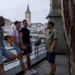 Zurich: LGBTQ city tour through Zurich incl. raclette - Starting Point: Bahnhofplatz at Zurich Main Station