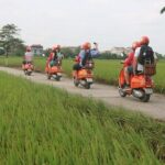 Beautiful Female Riders Vespa Red River Countryside Tour 5 Hours - The Sum Up