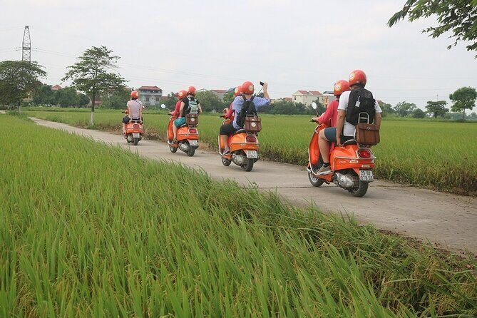 Beautiful Female Riders Vespa Red River Countryside Tour 5 Hours - The Sum Up