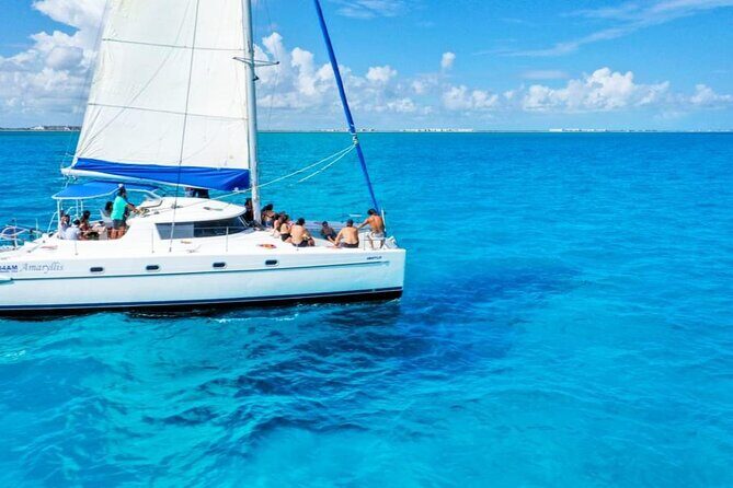 Catamaran Tour to Isla Mujeres Snorkeling with Buffet and Open Bar - The Sum Up