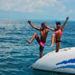 Catamaran tour to Isla Mujeres with snorkeling, open bar - Authentic Experiences and Practical Tips