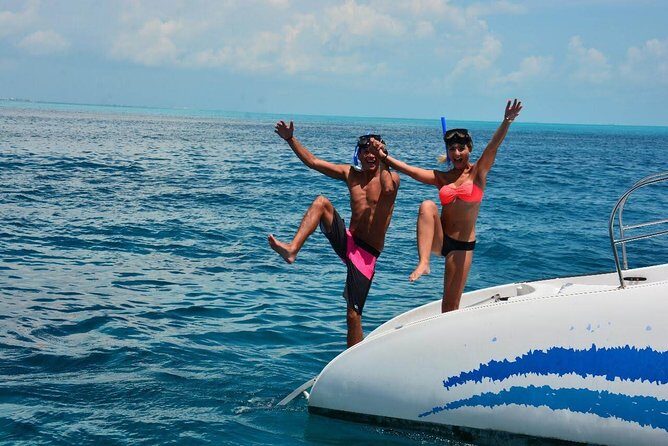 Catamaran tour to Isla Mujeres with snorkeling, open bar - Authentic Experiences and Practical Tips