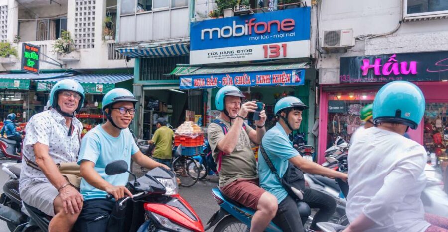 City Tour By Motorbike w/ War Museum & Reunification Palace - Exploring Saigon on a Motorbike