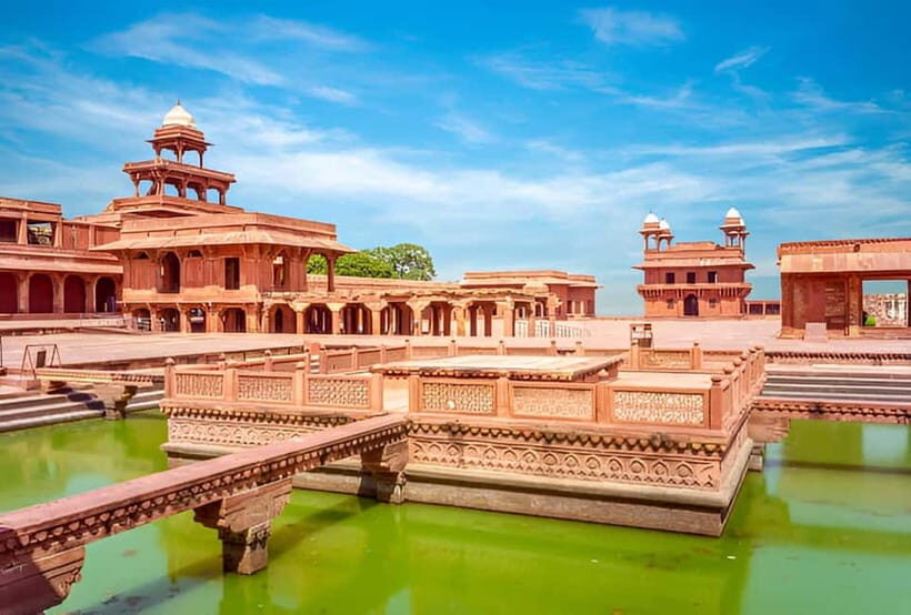 From Delhi: Taj Mahal, Agra Fort & Fatehpur Sikri Day Trip - Visiting the Taj Mahal: An Iconic Wonder