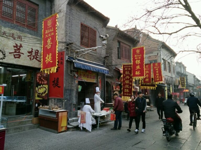 Luoyang Classic Day Tour Longmen Grottoes Old Twon Explore - An In-Depth Look at the Luoyang Classic Day Tour
