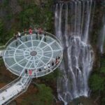 Private Day Tour to Gulong Canyon Glass Bridge from Guangzhou - Discovering the Waterfalls and Scenic Walkways