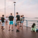 Riverside Walking Tour with Snack, Drinks & Local Ferry Ride - Authentic Local Experiences