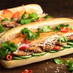 Saigon By Night and Vietnam Local Food on Motorbike - Detailed Breakdown of the Itinerary