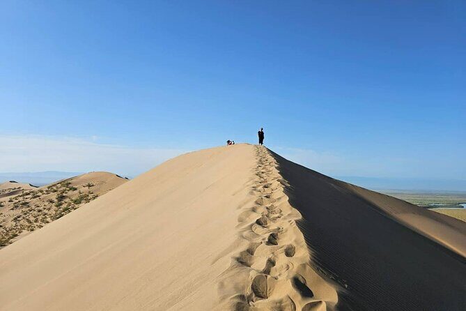 Singing dunes & Aktau mountains group tour to Altyn Emel - Discovering Aktau Mountains: The Dried Ocean’s Chalk Formations