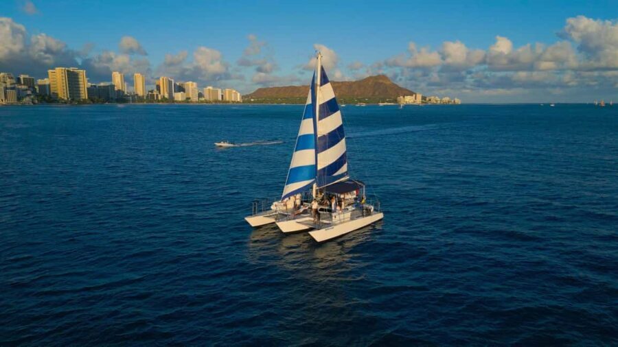 Waikiki: Sunset Swim & Sailing Experience - The Experience in Detail