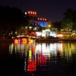Beijing Imperial Dining Experience at Bai Jia Da Yuan Restaurant with Houhai Lake Bar Tour - Sightseeing Drive: Illuminated Landmarks and City Views
