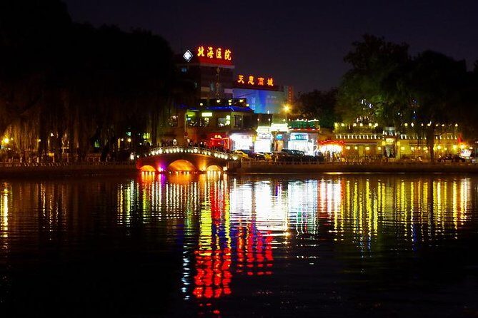 Beijing Imperial Dining Experience at Bai Jia Da Yuan Restaurant with Houhai Lake Bar Tour - Sightseeing Drive: Illuminated Landmarks and City Views