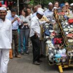 Dabbawala, Dhobi Ghat & Dharavi slum Tour with Local Train Ride - The Sum Up