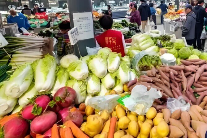 Dumpling Cooking Class and Local Market Tour - Exploring the Detailed Experience