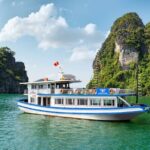 Ha Long Bay Cruise Day Tour with lunch, kayaking, surprise cave & titop island - The Sum Up
