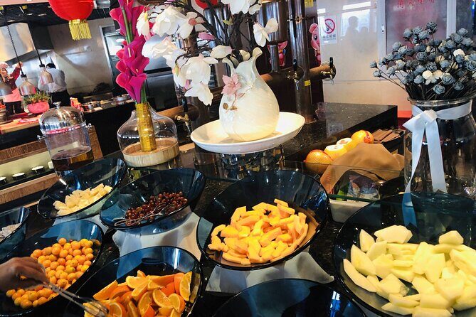 Half Day Tour: Summer Palace, Yuyuantan Park with CCTV Tower Dinning Experience - Authentic Experiences and Authenticity