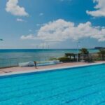 Okinawa: Sunset Beach Walk and Swim with Dinner - Key Points