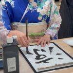 Tea and Calligraphy Session at a Table in Osaka - Who Will Love This?